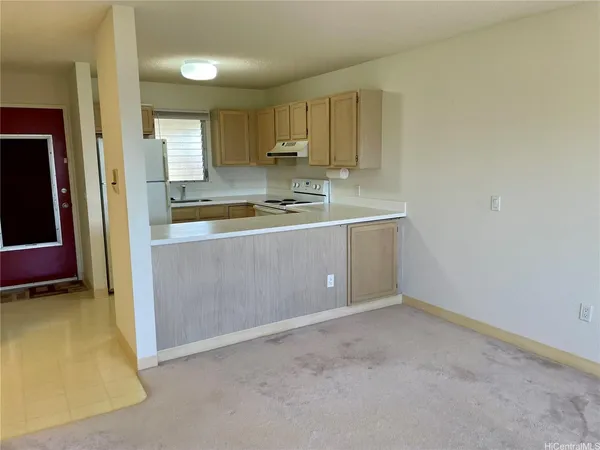 a large kitchen with a sink