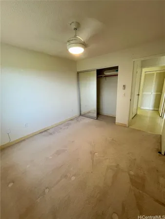an empty room with a bathroom
