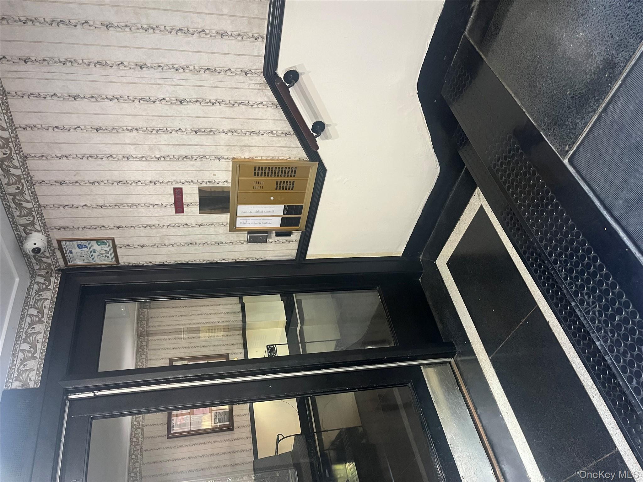 325 East 201st Street, Unit 4D Bronx, NY 10458 - Photo 2 of 22 Reception featuring wallpapered walls