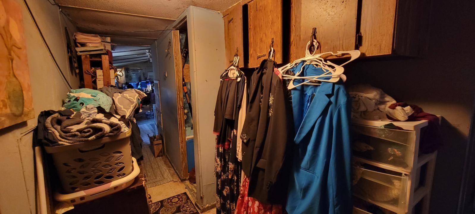 9160 Highway 1 St. Augustine, FL 32086 - Photo 6 of 8 a view of walk in closet with clothes and shoes