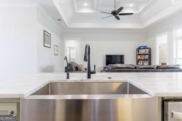 a view with a sink and a mirror