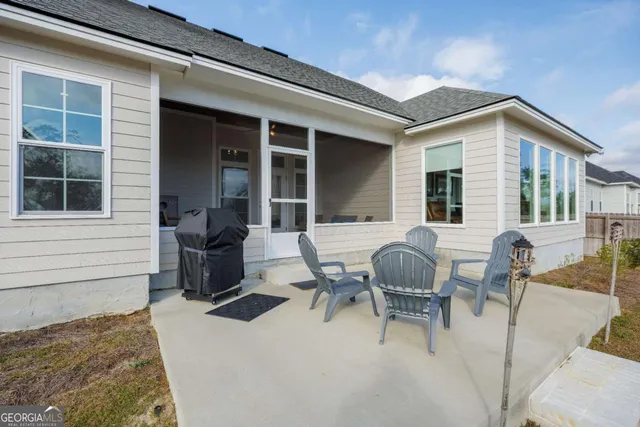 front view of house with outdoor seating