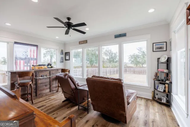 a living room with furniture and a window