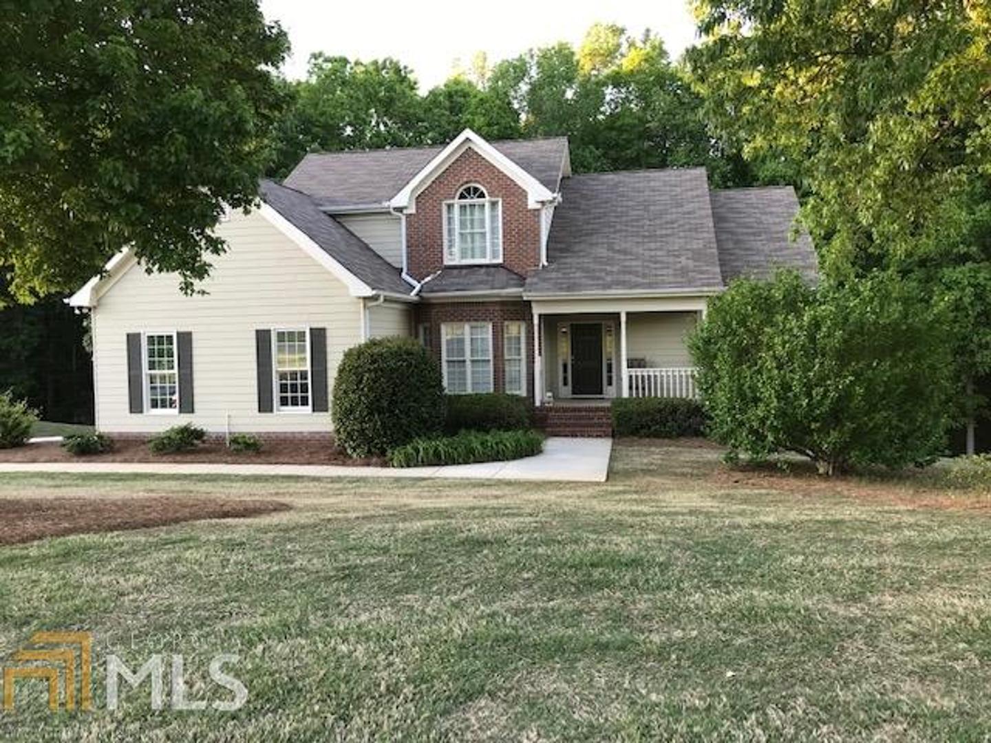 1131 Ridgefield Drive Bishop, GA 30621 - Photo 1 of 1 a front view of a house with a garden