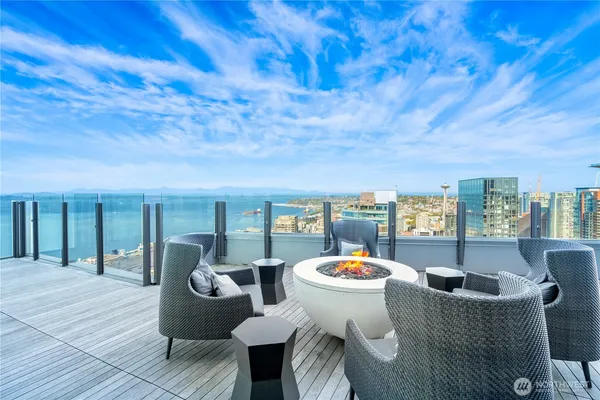 a outdoor dining space with furniture and outdoor view