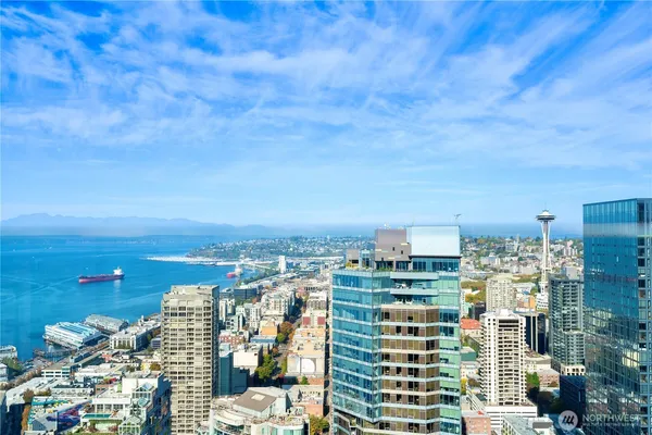 a view of a city with tall buildings