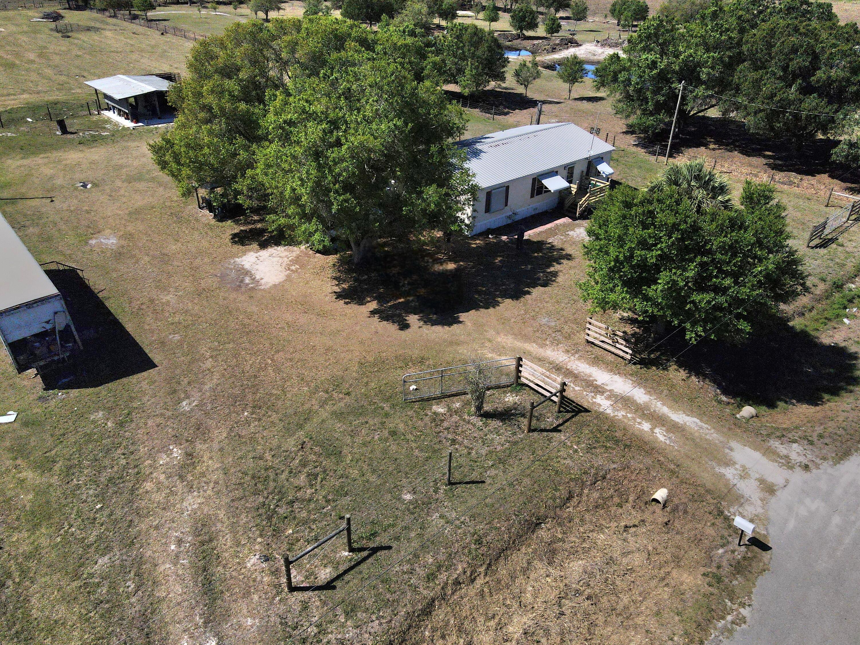 1651 Coffey Road Moore Haven, FL 33471 - Photo 3 of 29 SIde View Aerial of Home