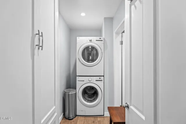 a bathroom with a toilet a sink and a mirror