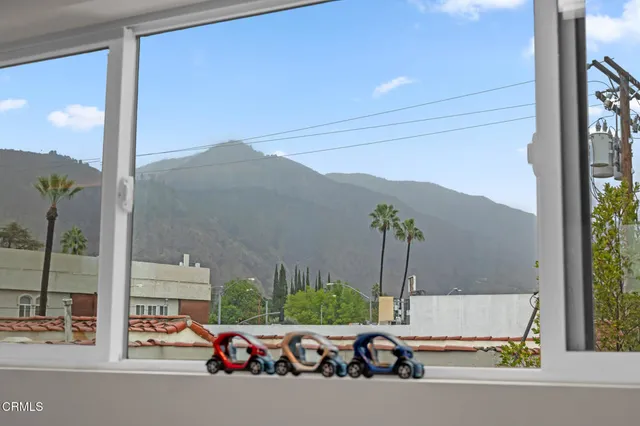 a bathroom with a toilet a sink and shower