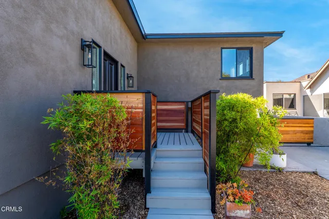 a view of a balcony with an outdoor space