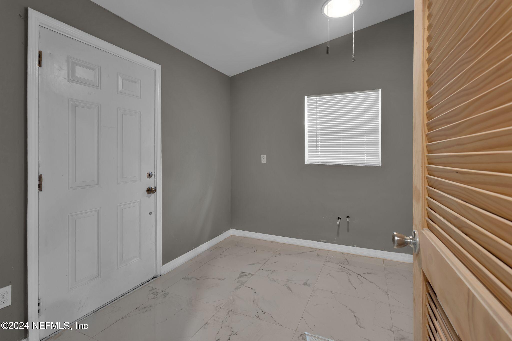 10357 Anson Road Jacksonville, FL 32246 - Photo 21 of 27 a view of an empty room