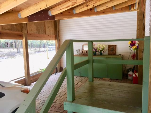 1401 Martin Road DeFuniak Springs, FL 32433 - Photo 16 of 51 Carport to Back Door