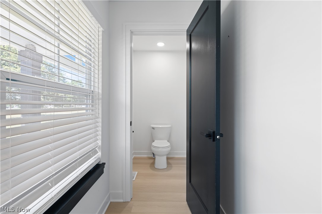 35799 Lorain Road North Ridgeville, OH 44039 - Photo 20 of 50 1st Floor Half-Bathroom with toilet and wood-type flooring