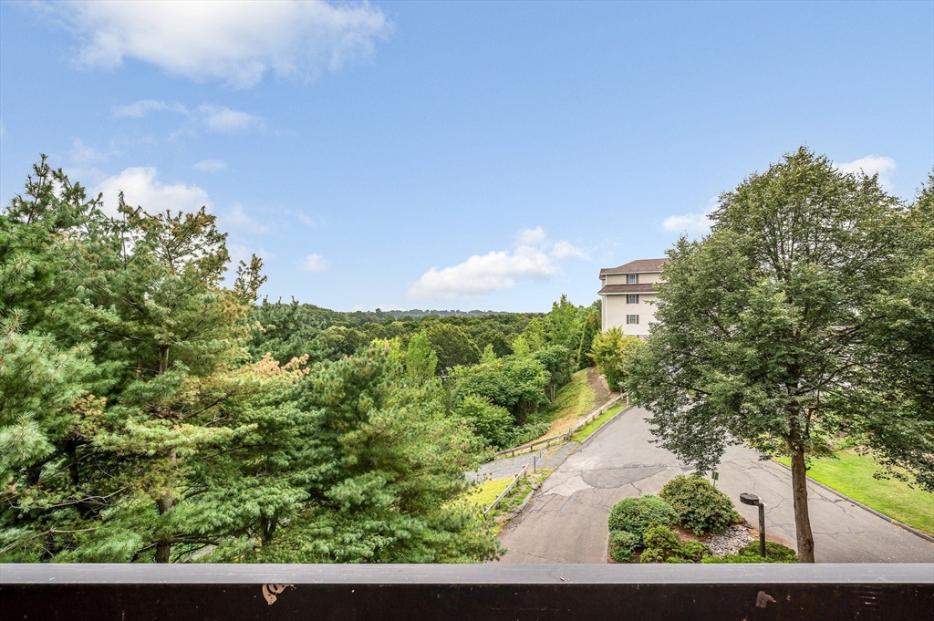 4 Summit Drive, Unit 413 Reading, MA 01867 - Photo 17 of 20 a view of a city