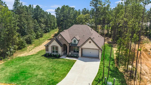 $529,990 | 11772 Oakwood Ranch Drive, Willis, TX 77378