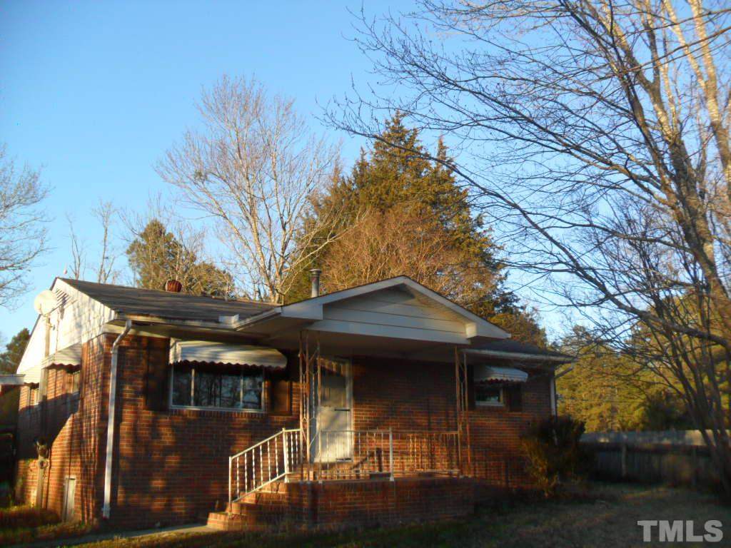 4611 Bragg Road Durham, NC 27704 - Photo 1 of 10 a view of a house with a yard