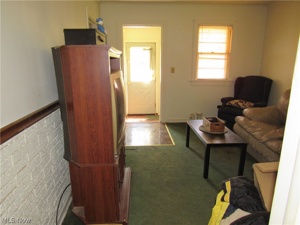 7301 South Ridge Road Madison, OH 44057 - Photo 4 of 26 Living room view from kitchen