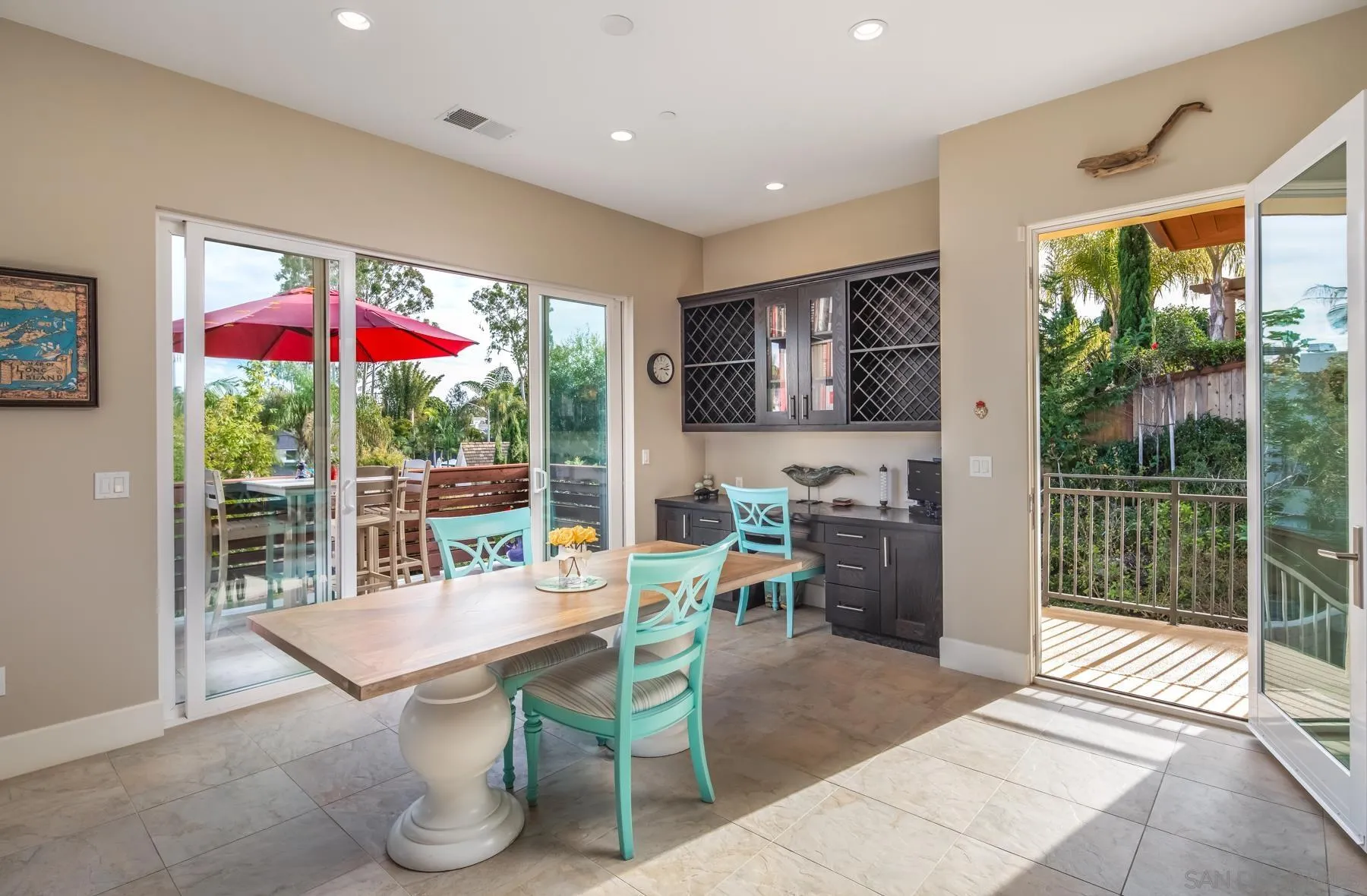 1815 Oak Avenue Carlsbad, CA 92008 - Photo 15 of 46 a view of a dining room with furniture window and outside view