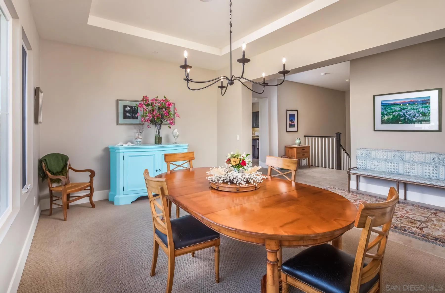 1815 Oak Avenue Carlsbad, CA 92008 - Photo 21 of 46 a view of a dining room with furniture and a chandelier