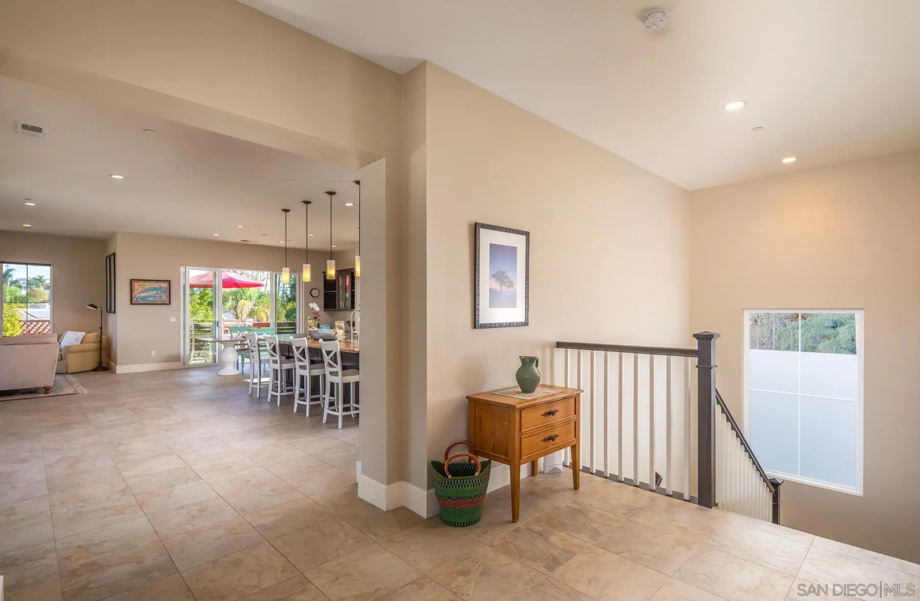 1815 Oak Avenue Carlsbad, CA 92008 - Photo 22 of 46 a view of a hallway with dining room and furniture