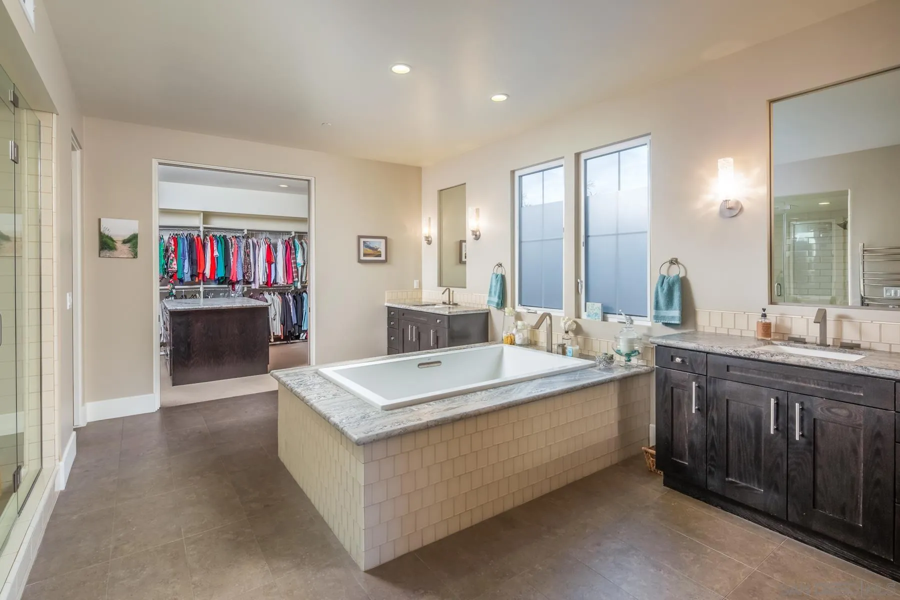 1815 Oak Avenue Carlsbad, CA 92008 - Photo 25 of 46 a spacious bathroom with a sink and a mirror