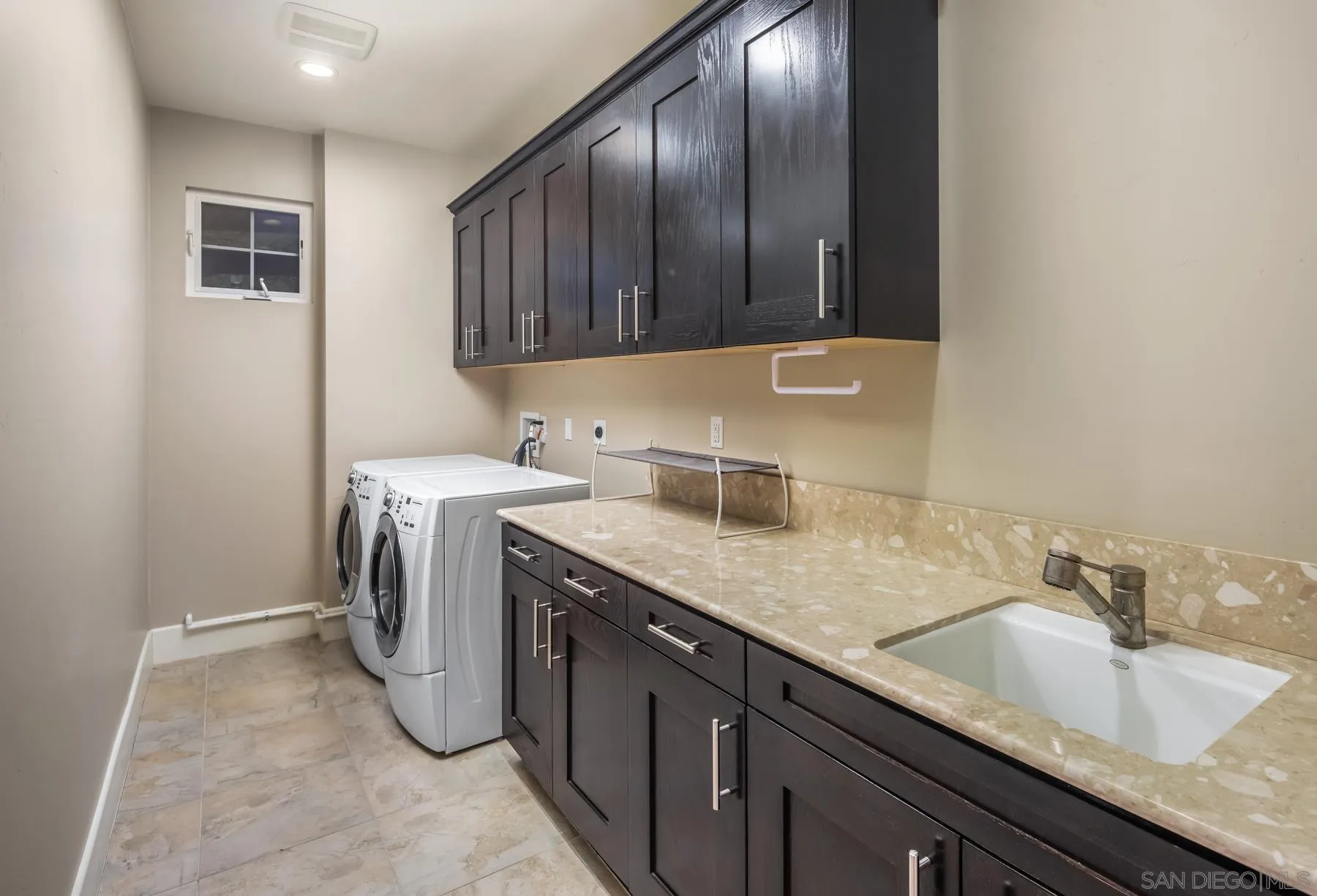 1815 Oak Avenue Carlsbad, CA 92008 - Photo 36 of 46 a utility room with a sink a washer and dryer