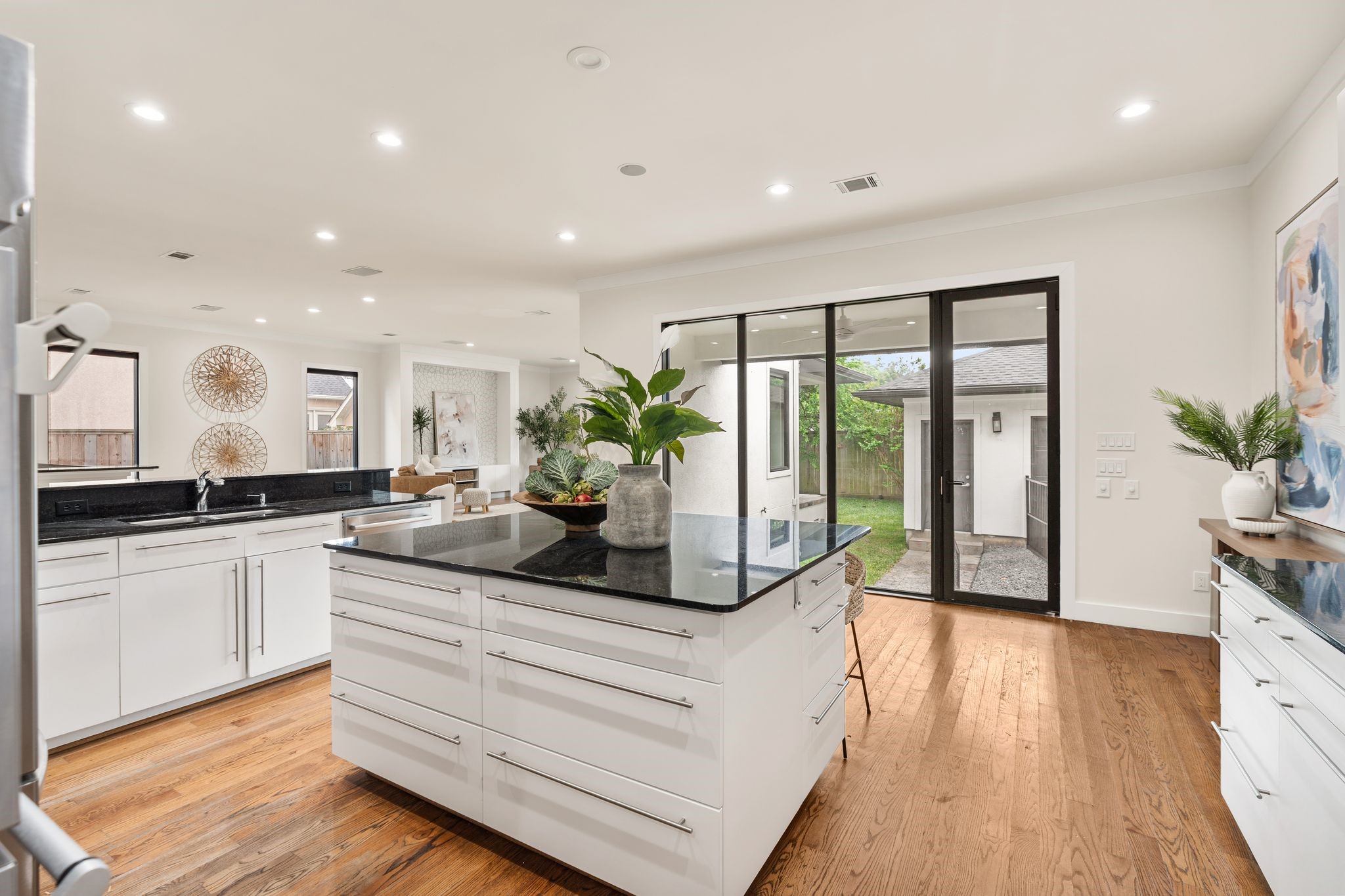 3847 Durness Way Houston, TX 77025 - Photo 11 of 48 If storage is what you need, this kitchen delivers—offering abundant cabinetry and thoughtful organization. Enjoy a lovely view from the kitchen out to the patio and backyard.