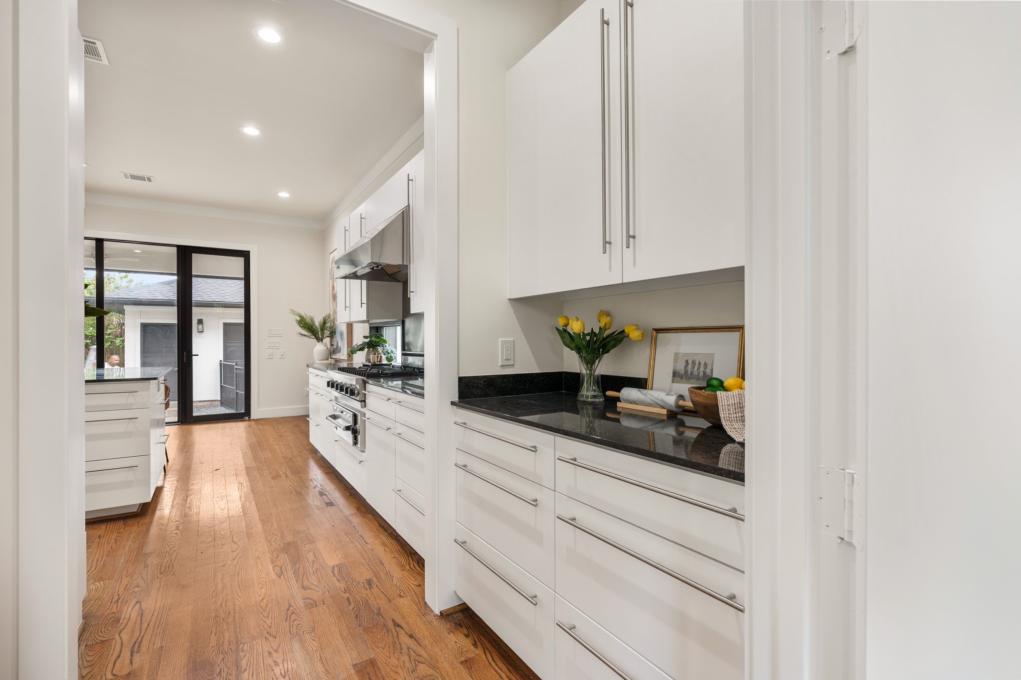 3847 Durness Way Houston, TX 77025 - Photo 20 of 48 Butler’s pantry conveniently located between the kitchen and dining room, with direct access to the walk-in pantry.