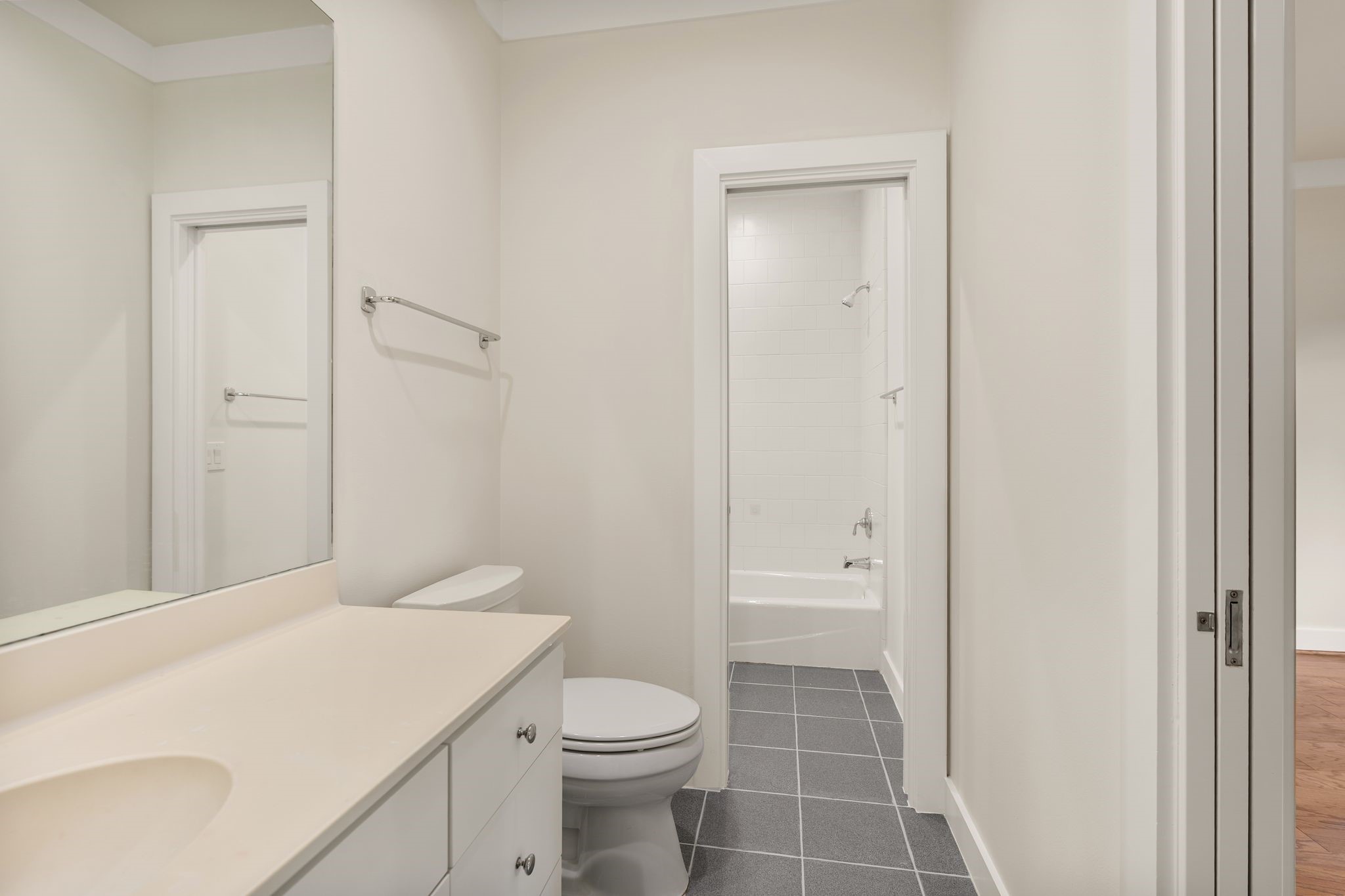 3847 Durness Way Houston, TX 77025 - Photo 32 of 48 The secondary bathrooms each have their own sink and toilet and share the shower/tub combo. Pocket doors divide the spaces for added privacy.