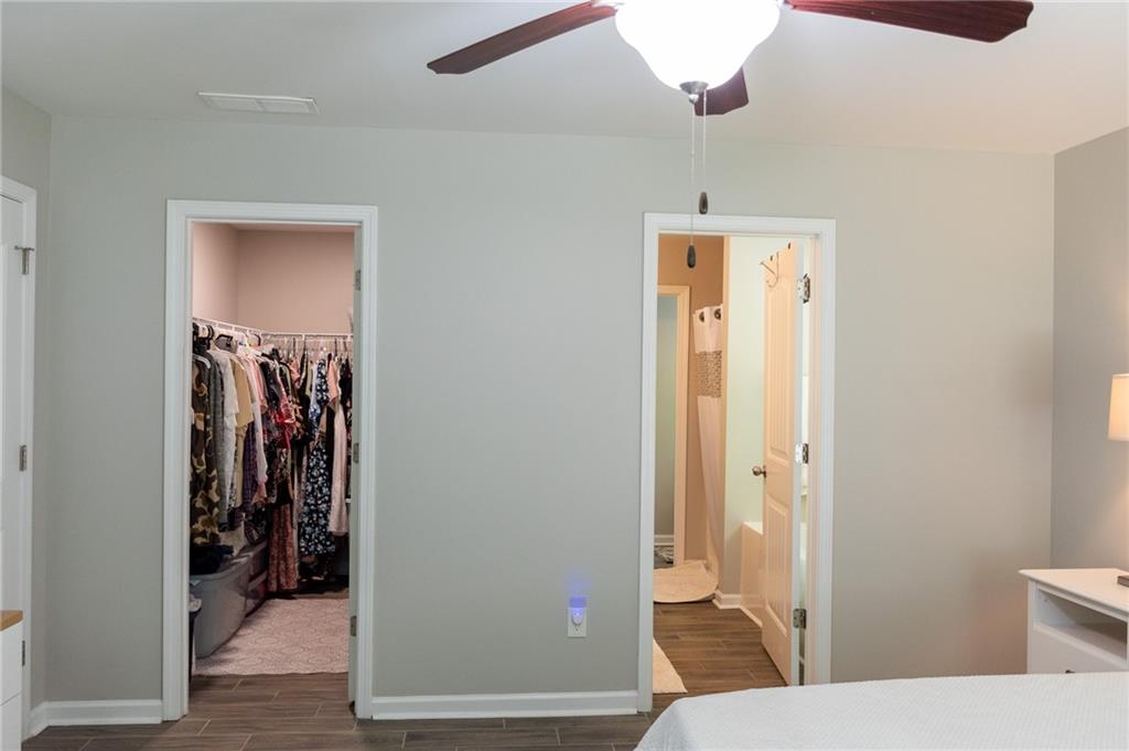 165 Pine Ridge Road Covington, GA 30016 - Photo 21 of 28 a bathroom with a sink and a mirror
