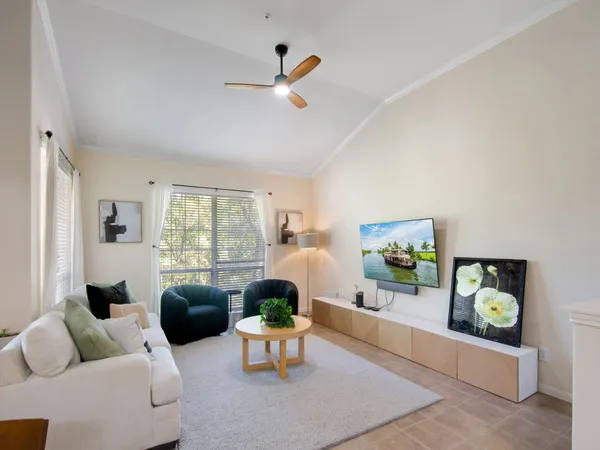 a living room with furniture and a window
