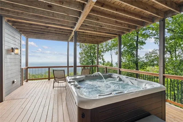 a living room with furniture workspace and wooden floor