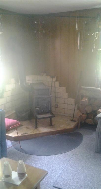 50 Howard Road Moscow, ME 04920 - Photo 14 of 20 Wood Stove in Living Room