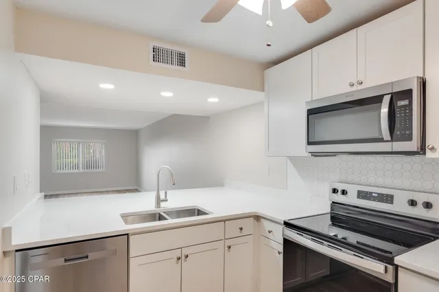 $179,900 | 112 Fairway Boulevard, Unit 101, Panama City Beach, FL 32407