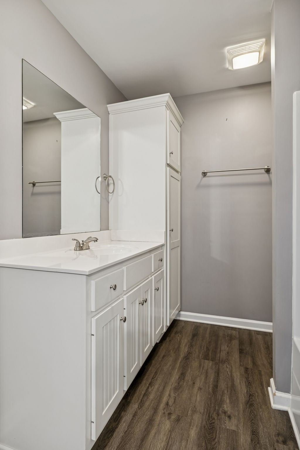 444 Edgewood Street Alexandria, TN 37012 - Photo 14 of 22 a bathroom with a sink a mirror and a shower