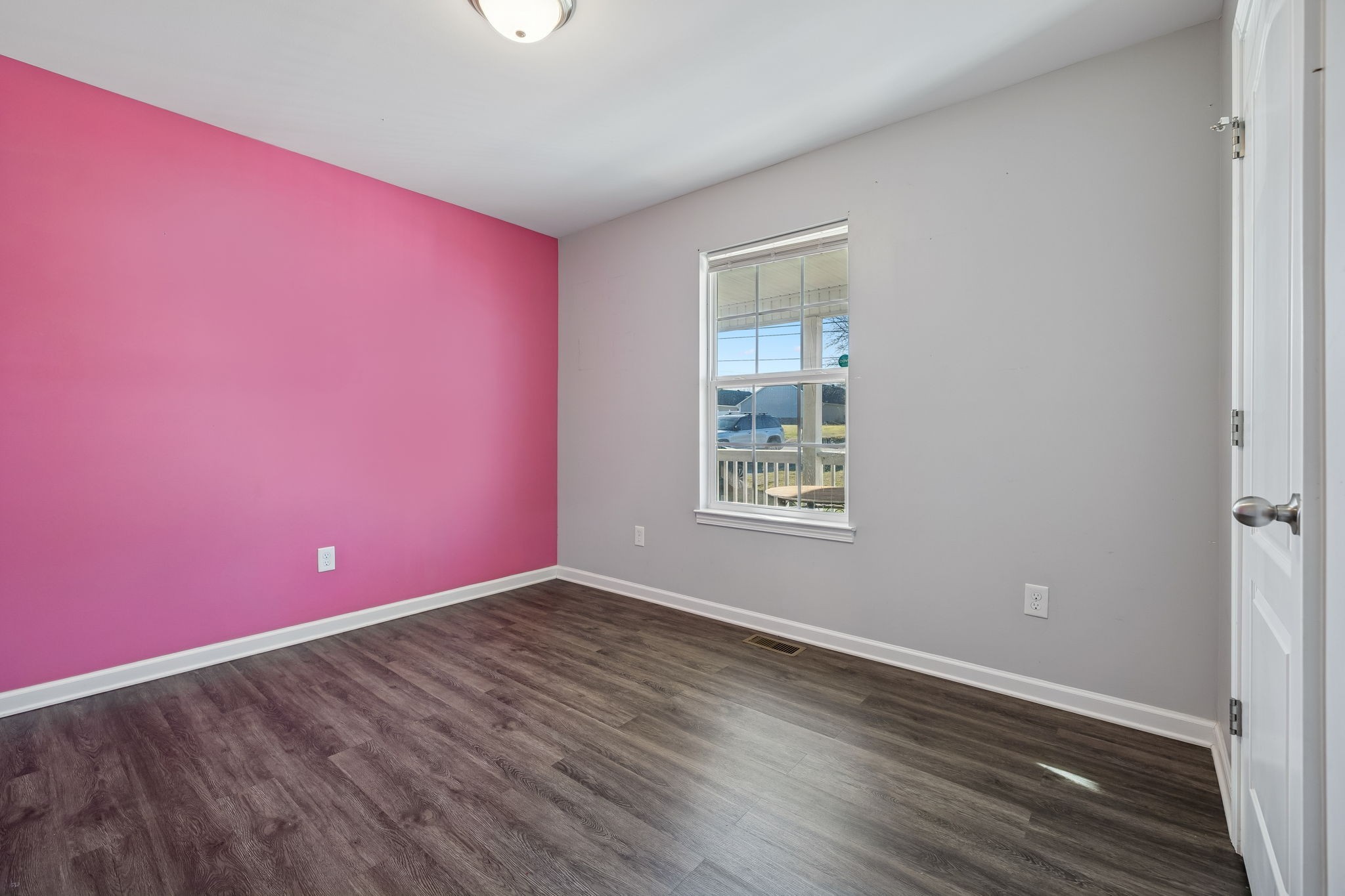 444 Edgewood Street Alexandria, TN 37012 - Photo 17 of 22 a view of empty room with wooden floor and fan