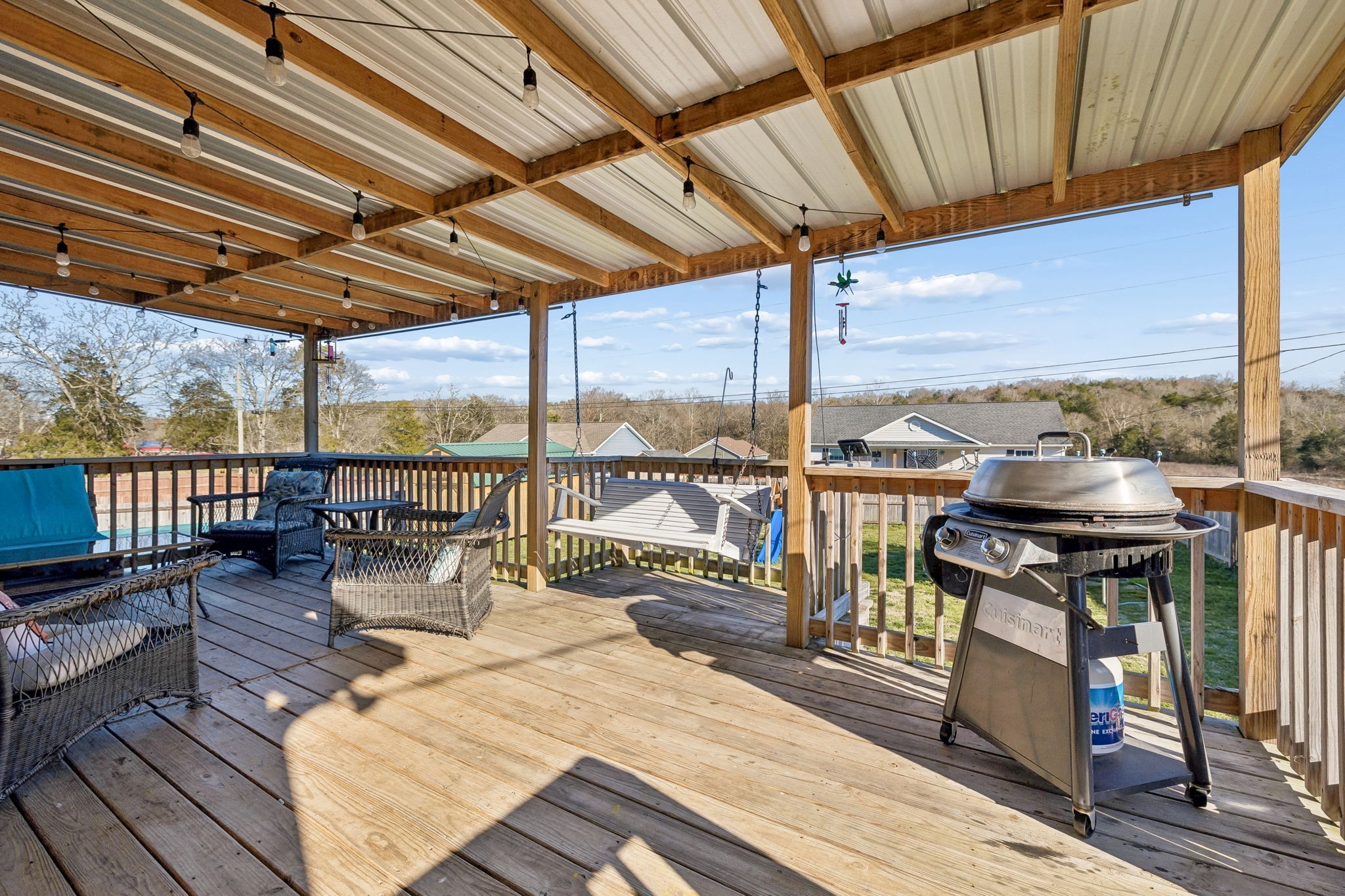 444 Edgewood Street Alexandria, TN 37012 - Photo 18 of 22 a view of a balcony with wooden floor and outdoor seating