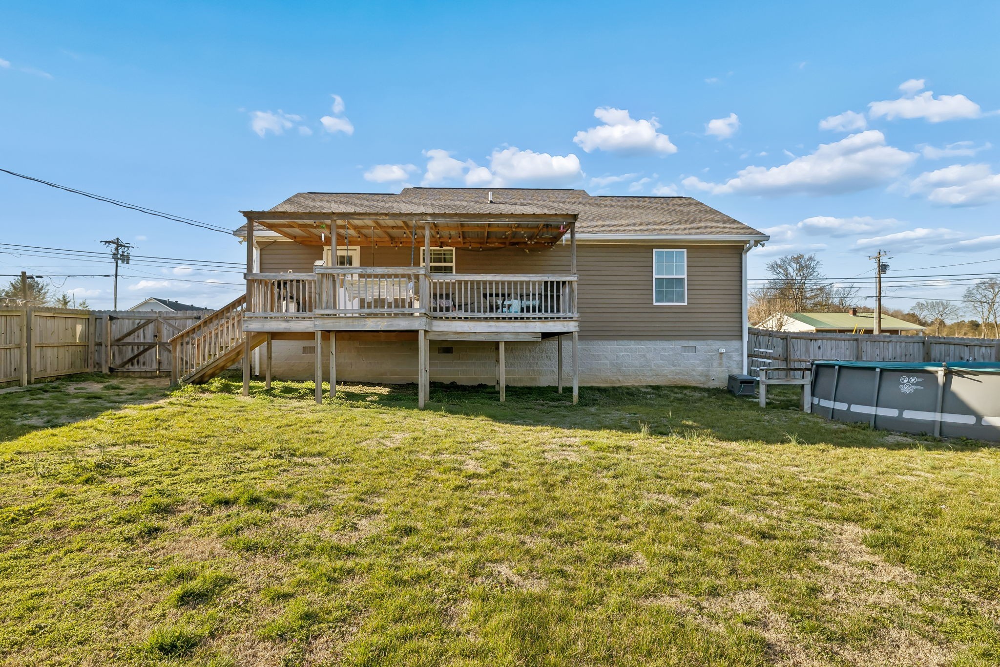 444 Edgewood Street Alexandria, TN 37012 - Photo 22 of 22 a view of a house with a swimming pool