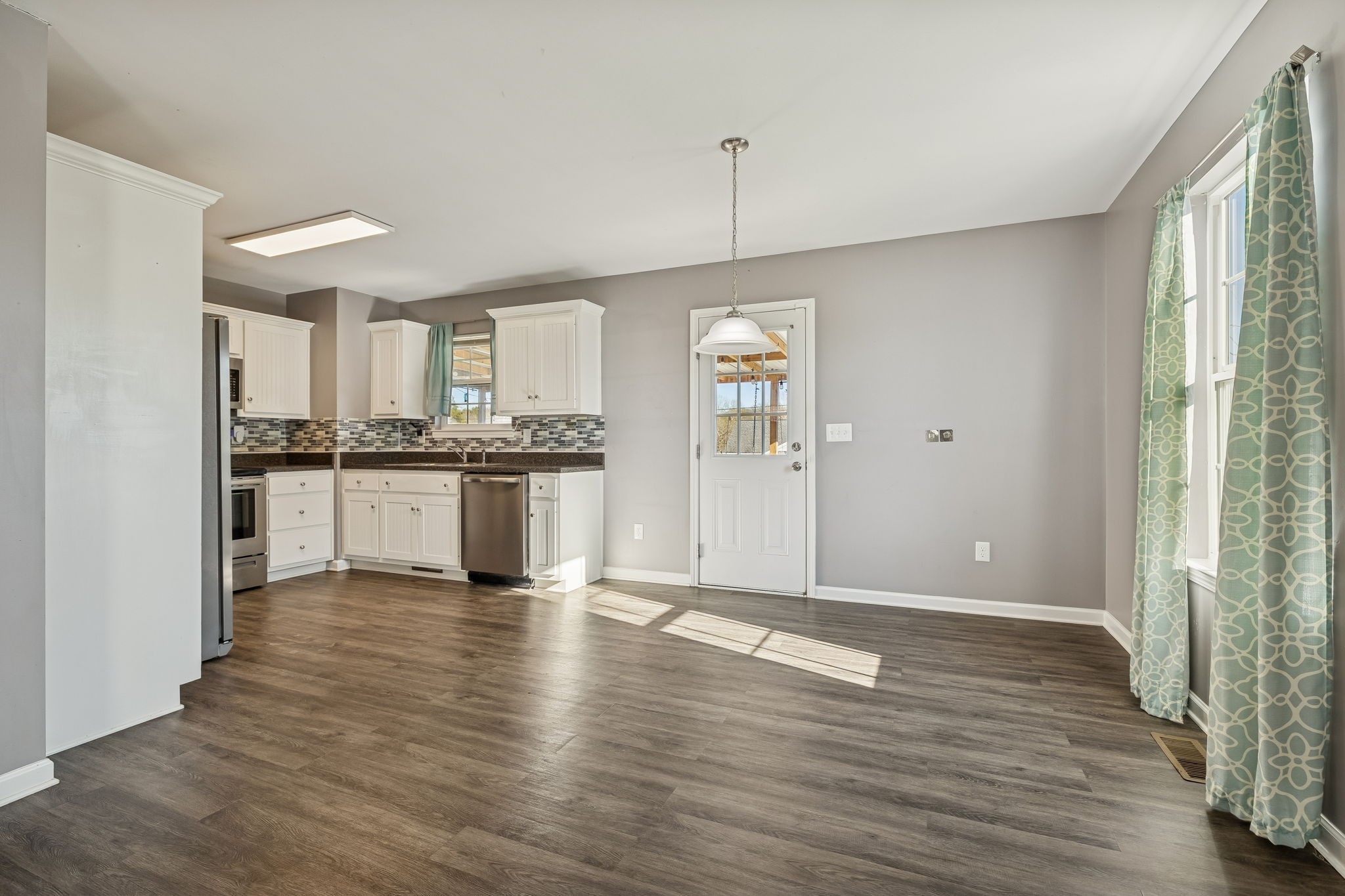 444 Edgewood Street Alexandria, TN 37012 - Photo 6 of 22 a view of kitchen with granite countertop cabinets and wooden floor