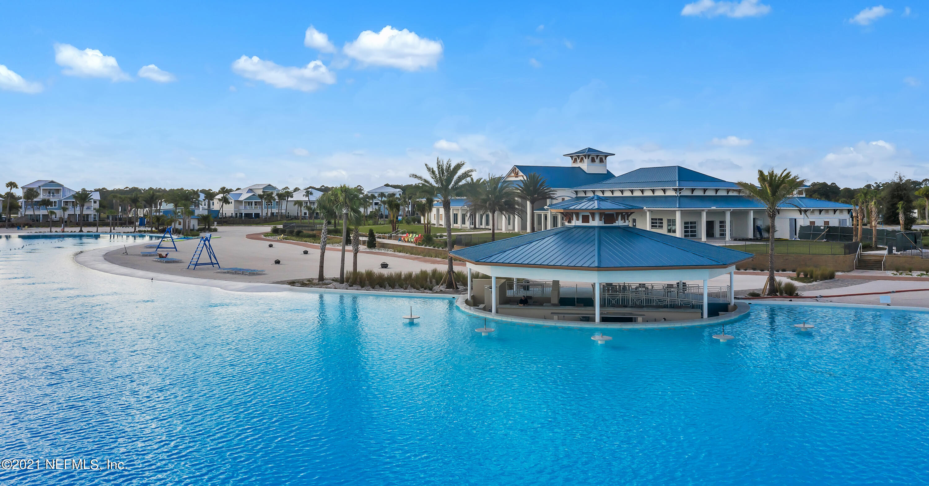 643 Rum Runner Way St. Johns, FL 32259 - Photo 15 of 33 a view of a swimming pool with a table and chairs