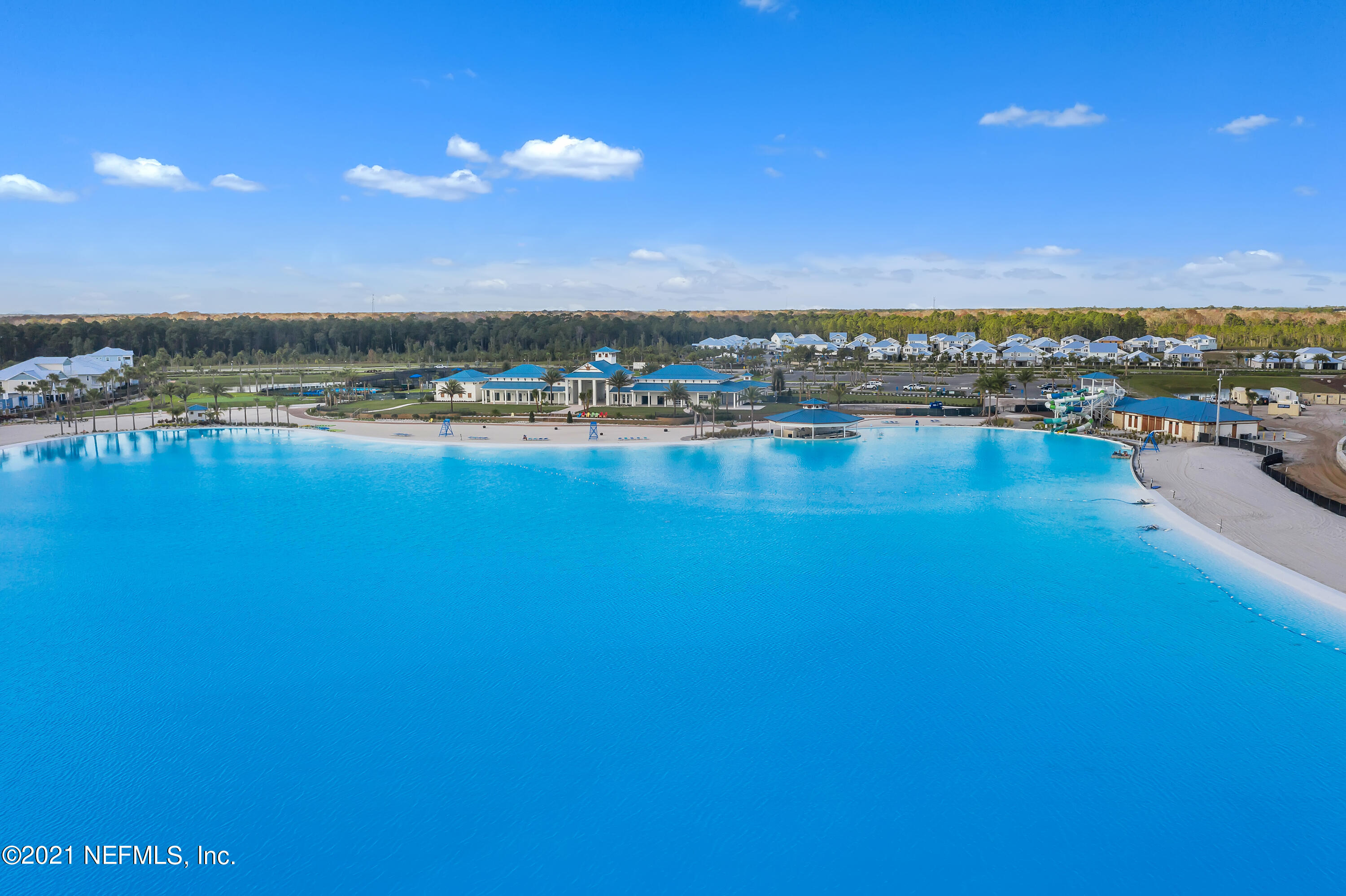 643 Rum Runner Way St. Johns, FL 32259 - Photo 16 of 33 a view of a lake with houses in the back