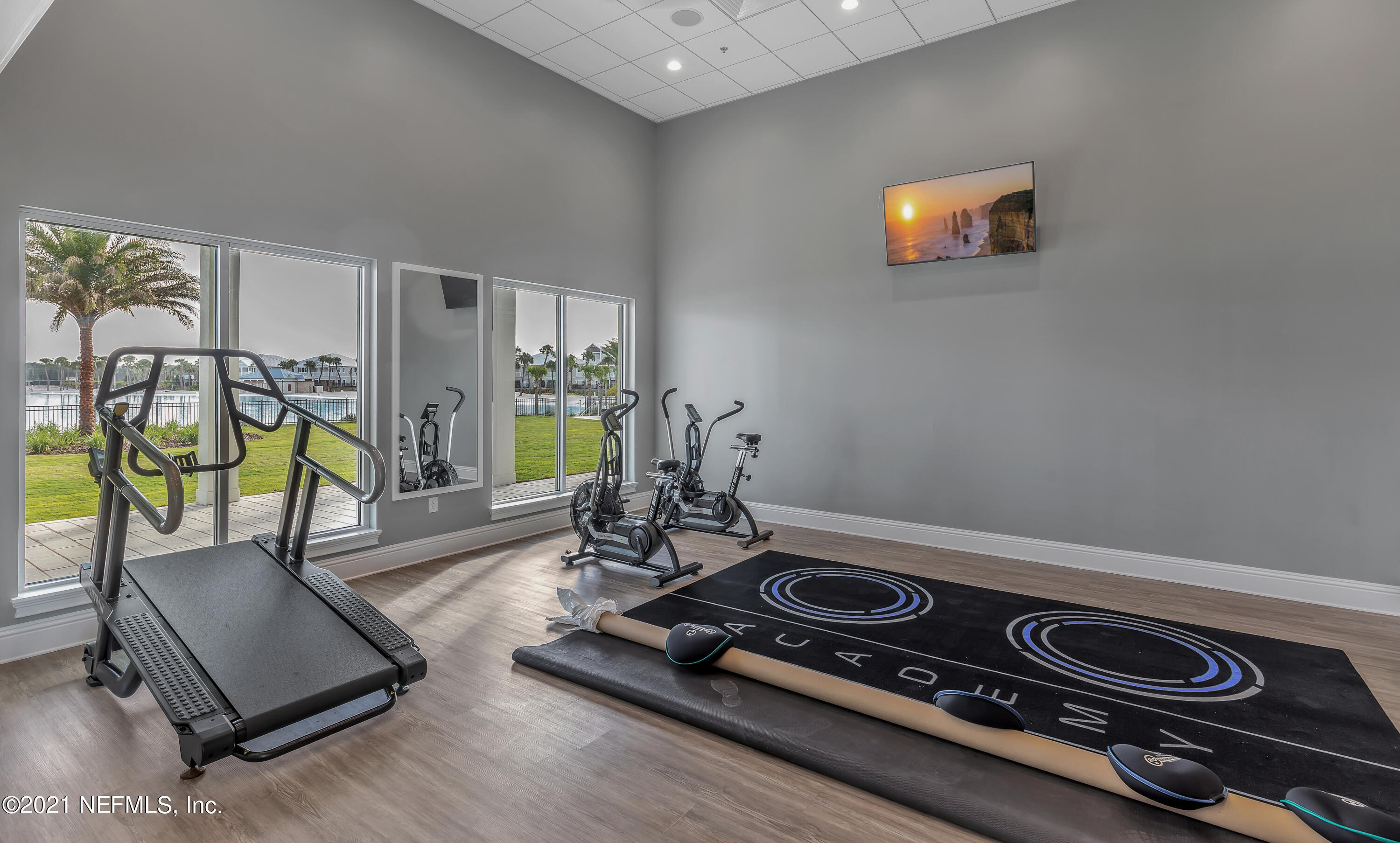 643 Rum Runner Way St. Johns, FL 32259 - Photo 7 of 33 a room with gym equipment and wooden floor