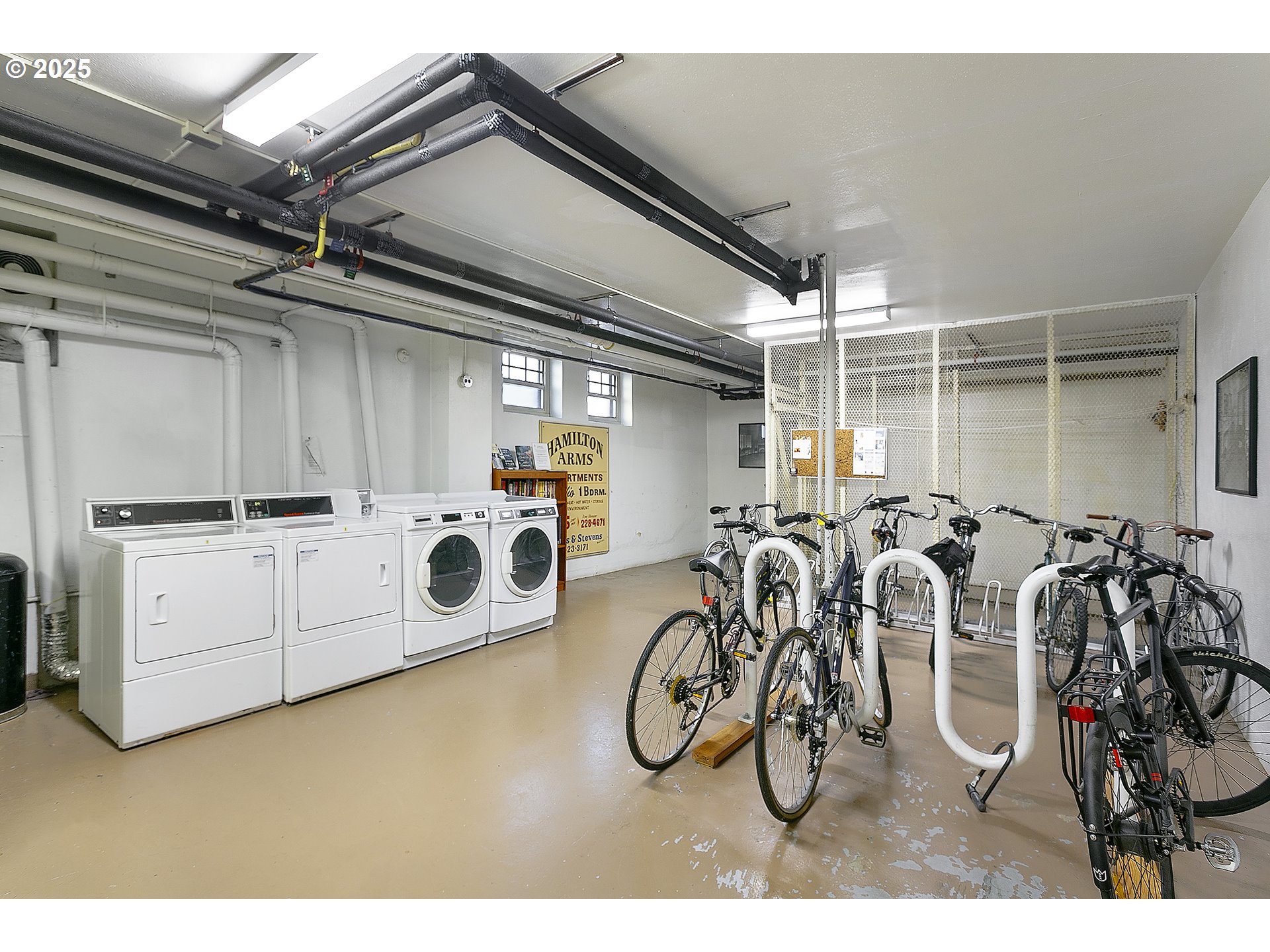 709 Southwest 16th Avenue, Unit 203 Portland, OR 97205 - Photo 14 of 16 a view of a room with gym equipment