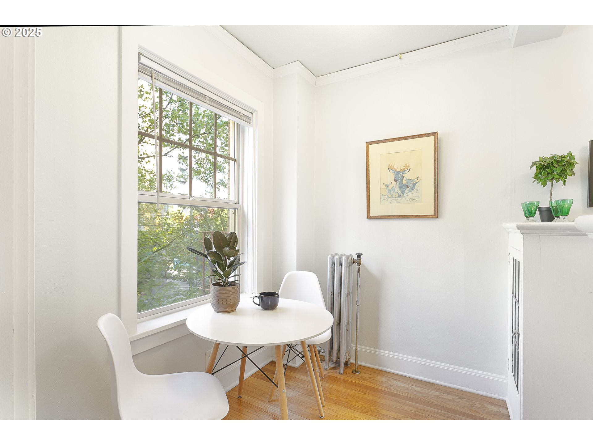 709 Southwest 16th Avenue, Unit 203 Portland, OR 97205 - Photo 8 of 16 a view of a dining room with furniture and a window
