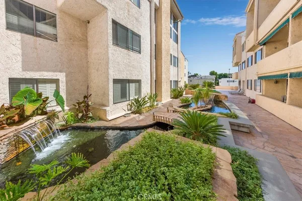a view of swimming pool with outdoor seating