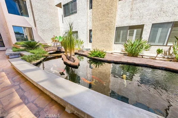 a view of a house with a swimming pool