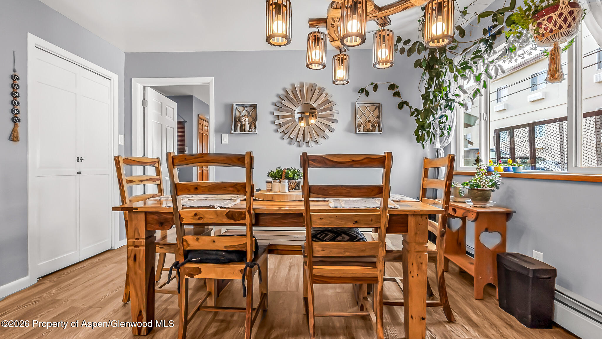 134 4th Street Meeker, CO 81641 - Photo 11 of 47 a dining room with furniture and wooden floor