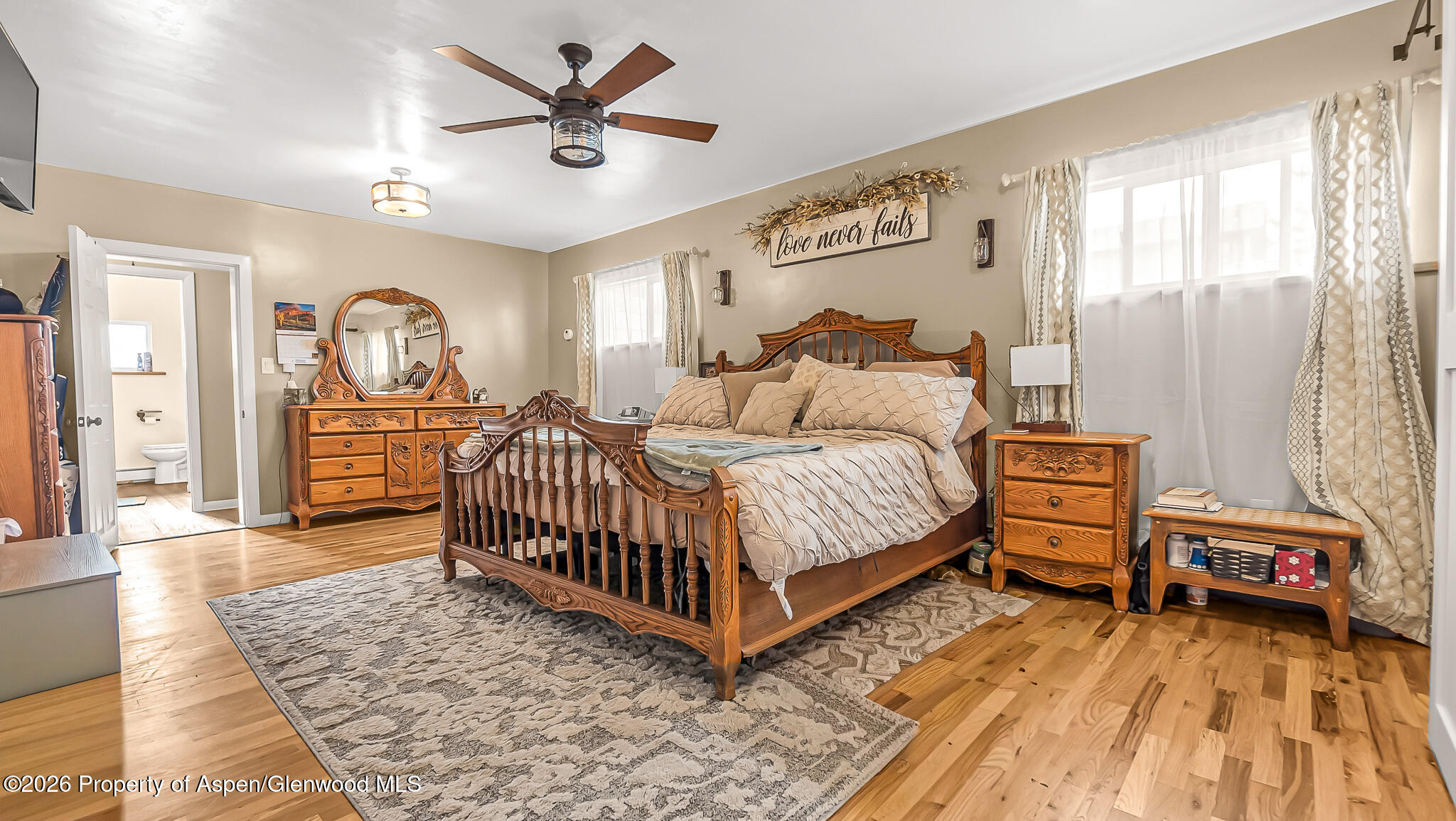 134 4th Street Meeker, CO 81641 - Photo 13 of 47 a bedroom with a bed and a walk in closet