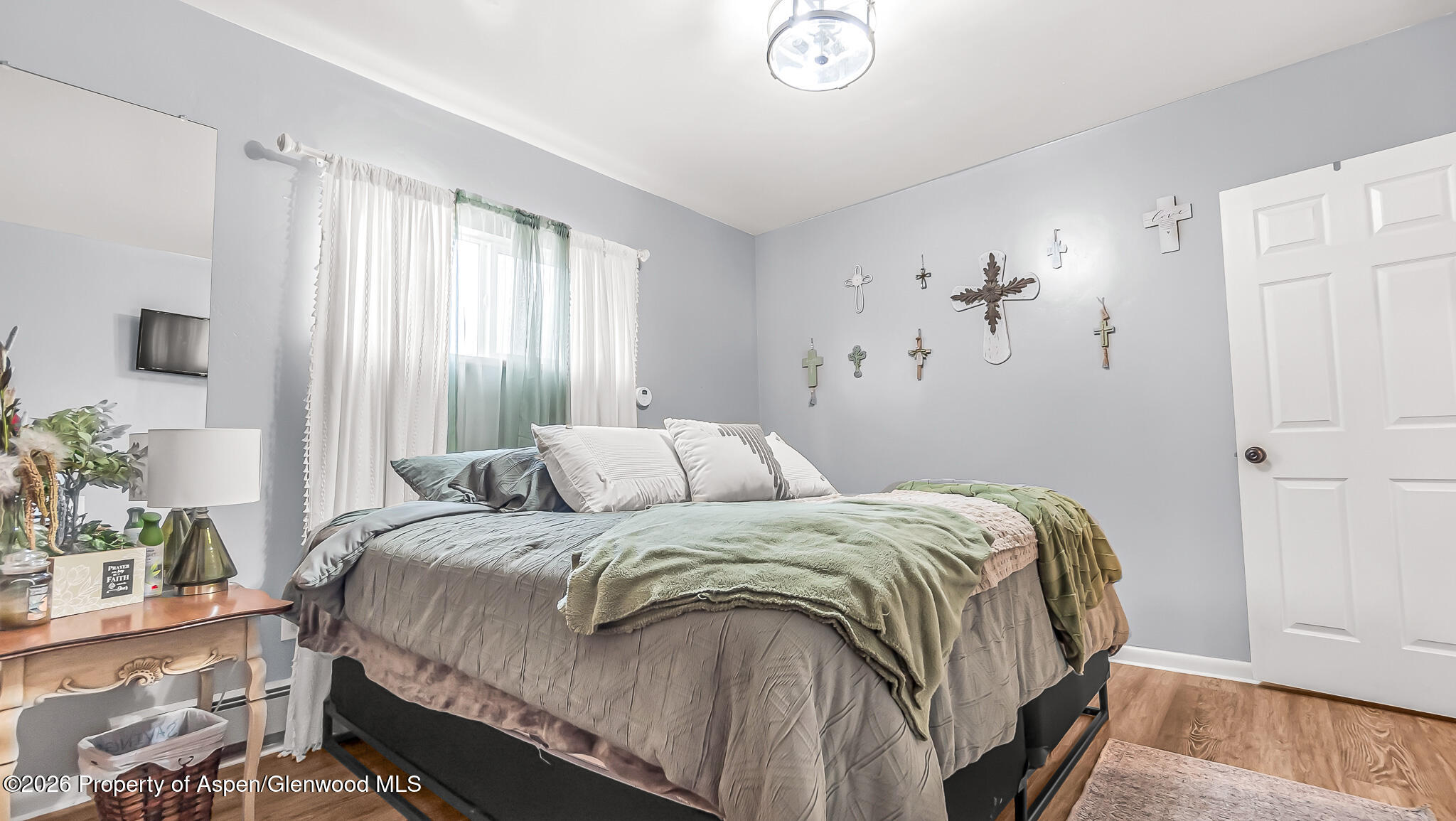 134 4th Street Meeker, CO 81641 - Photo 17 of 47 a bedroom with a bed and a window