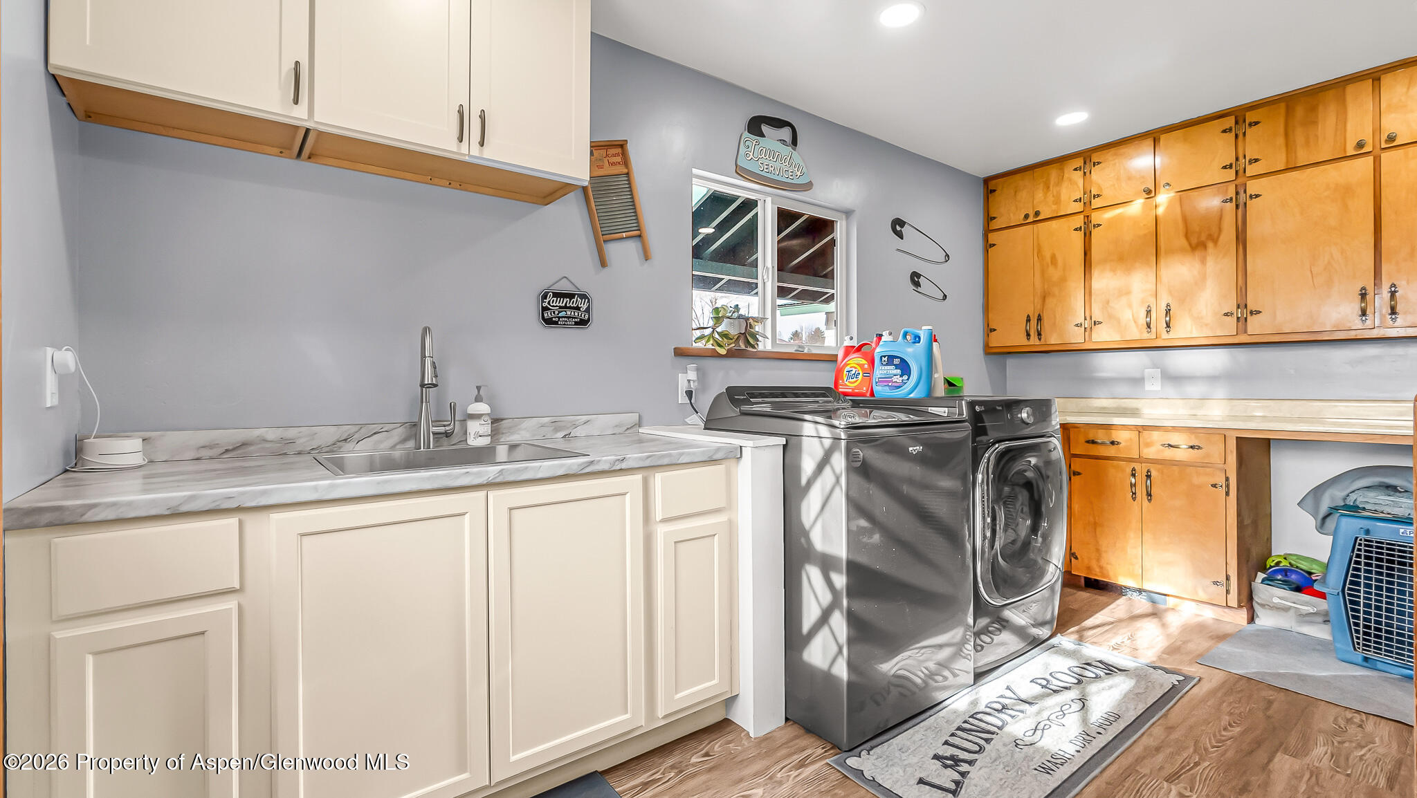 134 4th Street Meeker, CO 81641 - Photo 21 of 47 a utility room with stainless steel appliances granite countertop a sink and cabinets